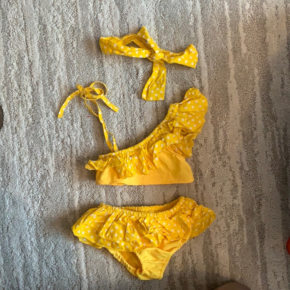 Size 18 months. Swim set with hair or head accessory